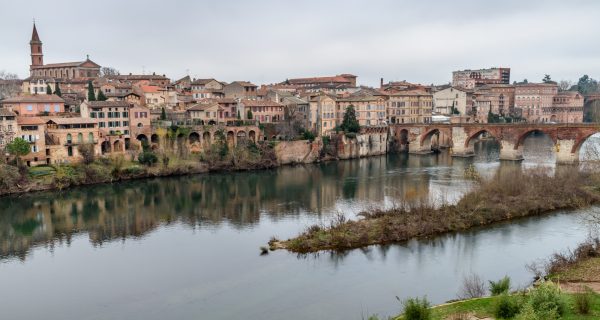 View of Albi, the city and historic buildings from the River Tarn.